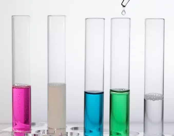 laboratory test tubes with colorful substances