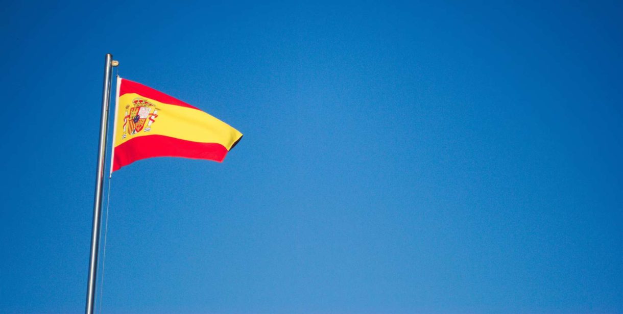 Spanish flag with a blue sky background - Requirements for Packaging and Plastic Tax in Spain