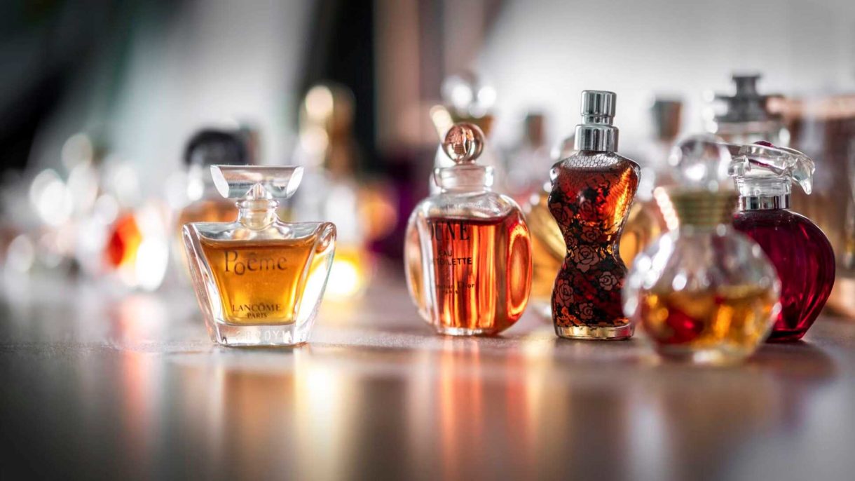 A collection of perfume bottles on a table