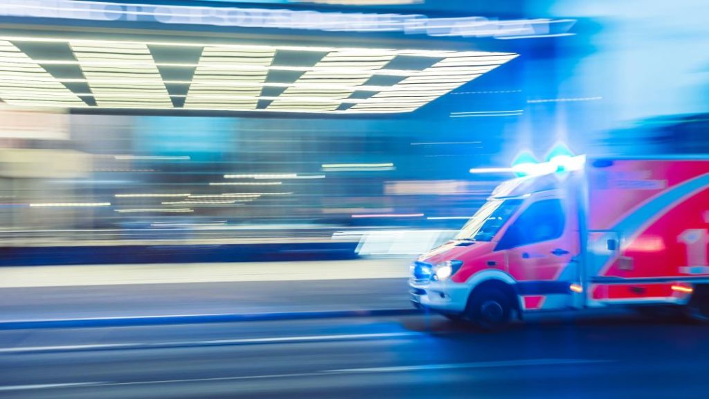 An ambulance driving down a street - cosmetovigilance in cosmetics regulations