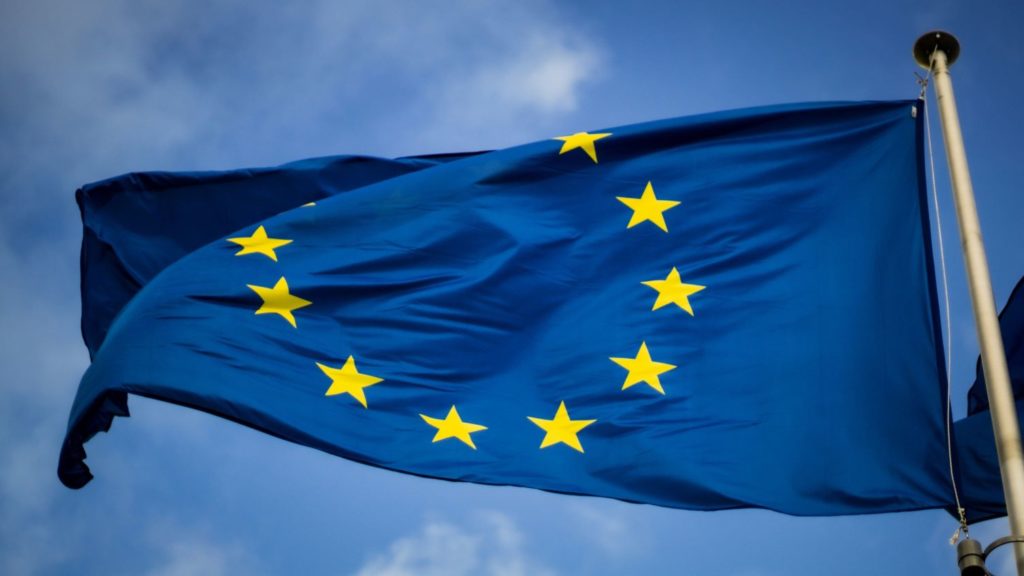 The flag of the European Union with a blue sky in the background - NCP requirements