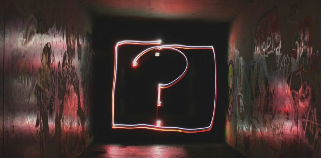 a neon question mark framed by a neon square - frequently asked questions about cpnp notification process