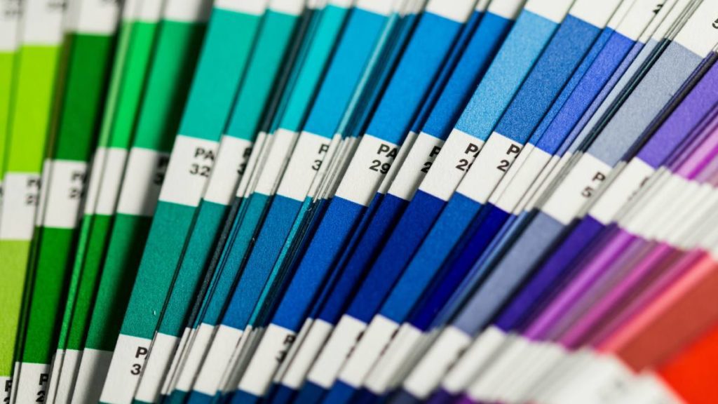 Pantone color swatches arranged in a fan