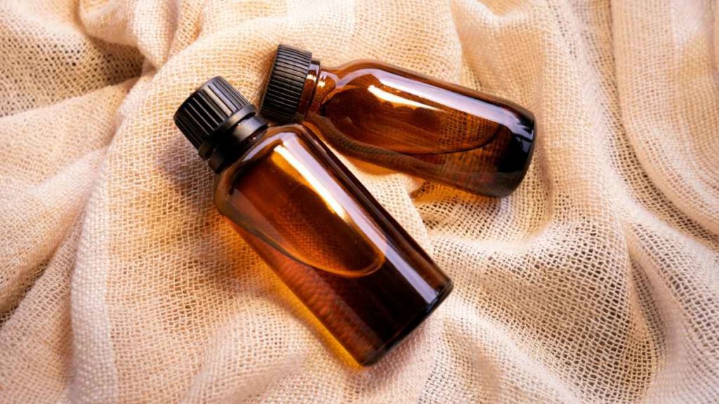 two glass bottles of soy extract used in cosmetics