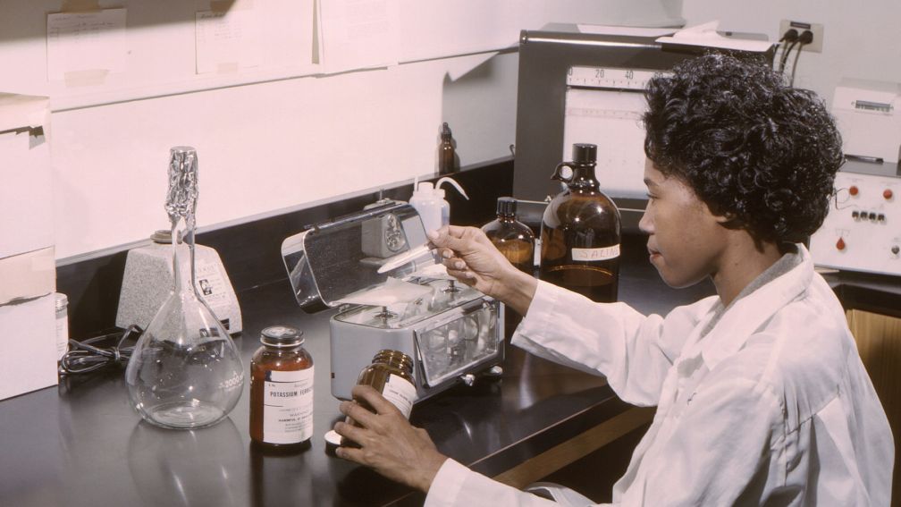female scientist working in a lab