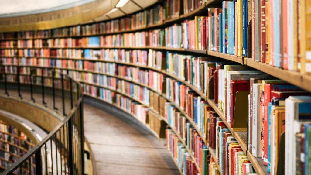 Long shelves of books inside a library